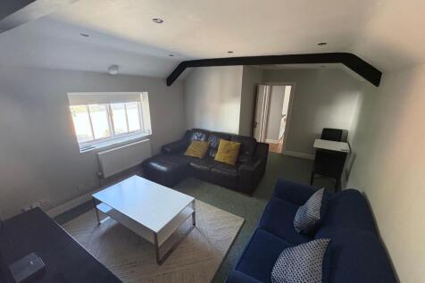 A cozy living room featuring two comfortable so...