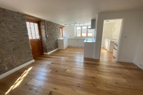 Bright and inviting kitchen space with natural ...