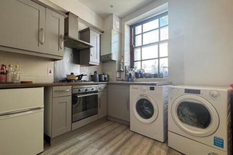 Bright and functional kitchen featuring modern ...