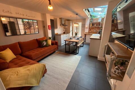 A stylish and inviting living room featuring a ...