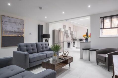 A spacious and stylish modern living room, perf...