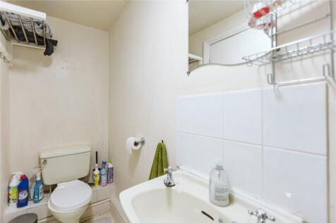 A clean and well-maintained bathroom featuring ...