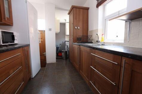 A neat and well-maintained kitchen featuring am...