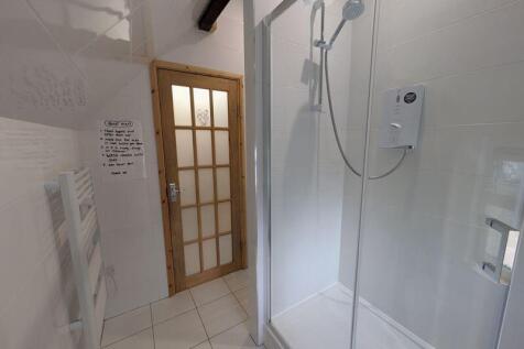A clean and well-maintained bathroom featuring ...