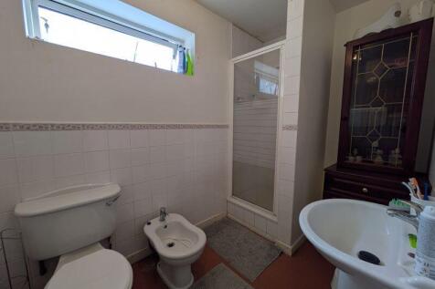 A clean and well-maintained bathroom featuring ...