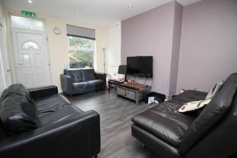 A contemporary living room featuring comfortabl...