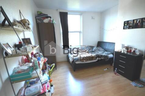 Bright and inviting master bedroom featuring a ...
