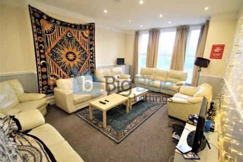 A cozy and inviting living room featuring comfo...