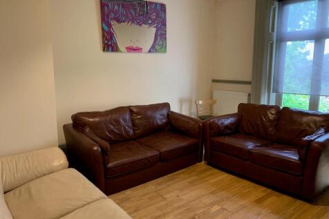 Cozy living room featuring comfortable leather ...
