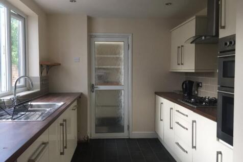 A modern kitchen with good natural light and cl...