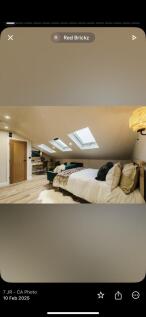 A beautifully designed spacious attic bedroom f...