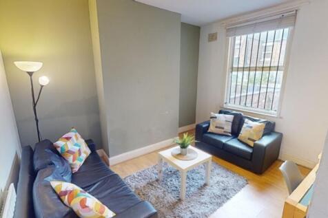 A cozy living room featuring comfortable seatin...