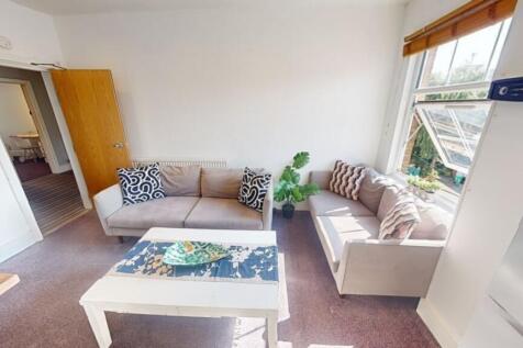 Bright and welcoming living room featuring two ...