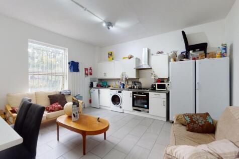 Bright and welcoming kitchen space featuring mo...