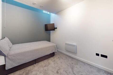 A modern and tidy single bedroom, perfect for a...