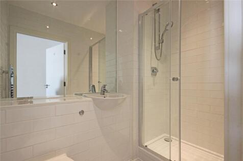 A modern and well-maintained bathroom featuring...