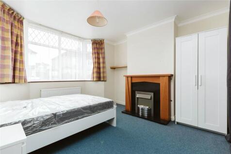 Bright and tidy double bedroom featuring a larg...
