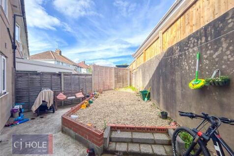 Bright and private garden space featuring a nea...