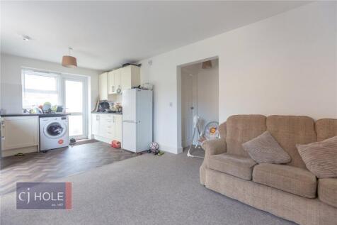Bright and inviting living room with a cozy sof...