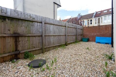 A private garden area featuring a gravel surfac...