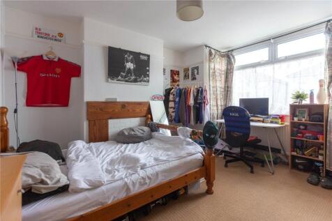 Bright and cozy double bedroom featuring a larg...