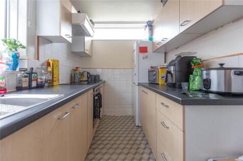 Bright and practical kitchen featuring ample co...