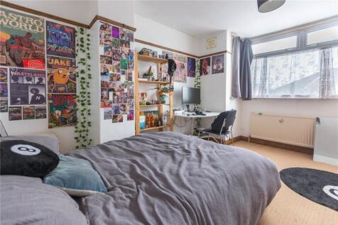 Bright and inviting master bedroom featuring a ...