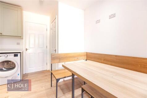 Bright and clean kitchen area featuring modern ...