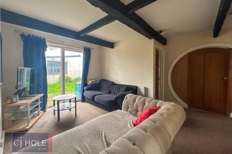 A cozy living room featuring comfortable seatin...