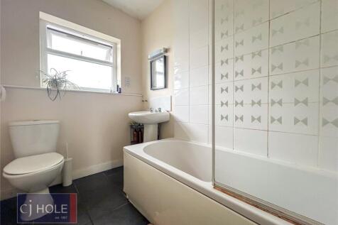 Bright and clean bathroom featuring a full bath...