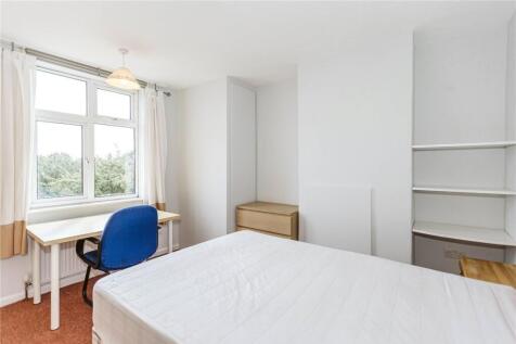 Bright and inviting double bedroom featuring a ...