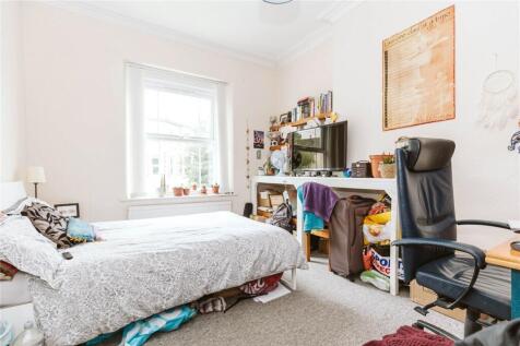 Bright and inviting double bedroom featuring a ...