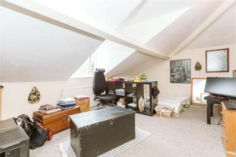 Bright and tidy attic room with sloping ceiling...