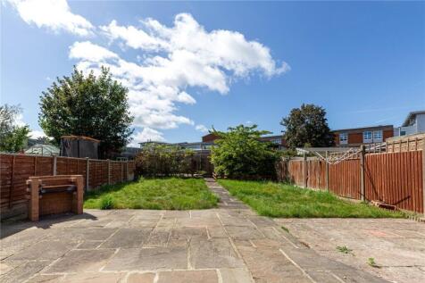 A bright and spacious garden area featuring a l...