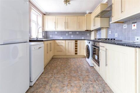 A bright and well-maintained kitchen featuring ...