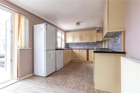 Bright and spacious kitchen featuring ample sto...