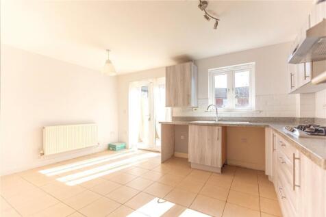 Bright, spacious kitchen with abundant natural ...