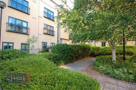 Beautifully landscaped garden area with mature ...