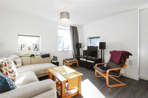 Bright and inviting living room featuring moder...