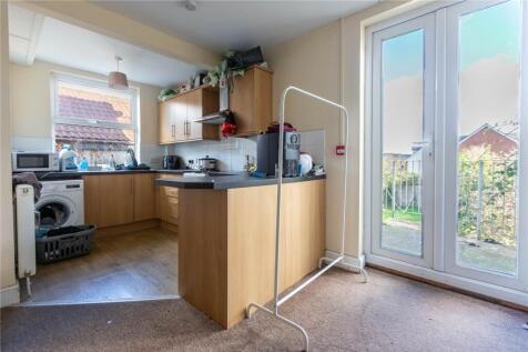Bright and functional kitchen with plenty of na...