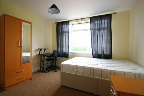 Bright and tidy single bedroom featuring a larg...