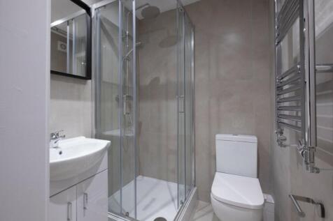 A modern and well-maintained bathroom featuring...
