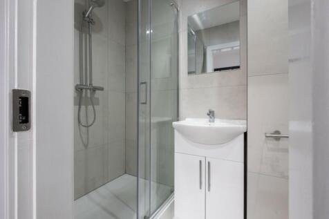 A modern and well-maintained bathroom featuring...