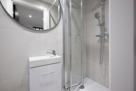 A modern and clean bathroom featuring a stylish...