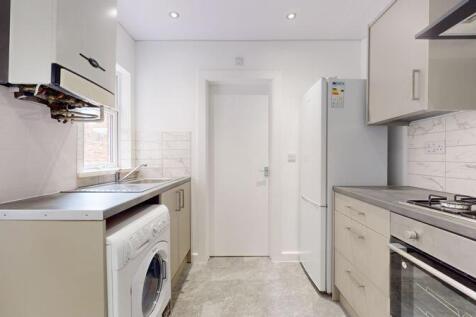 Modern and tidy kitchen with integrated applian...