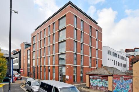 Modern brick-built terraced property with clean...