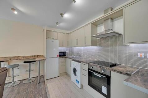 Modern kitchen with integrated appliances, incl...