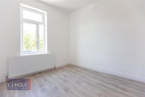 Bright and freshly decorated bedroom featuring ...
