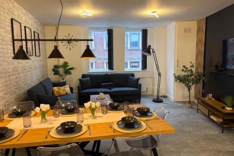 A modern and inviting living room featuring a s...