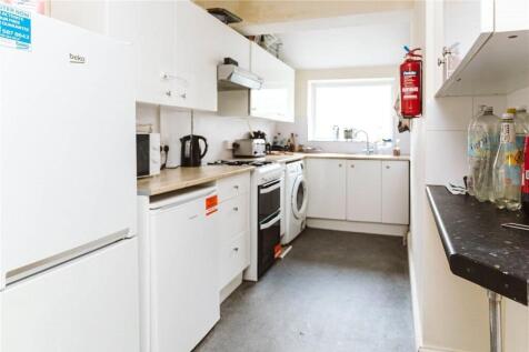 Bright and functional kitchen featuring ample c...